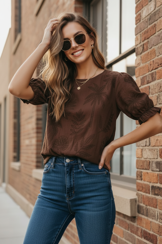 Sunday Funday Top in chocolate with sunglasses and a joyful smile in an urban building setting